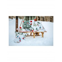 Textilný vankúš so zimným dekorom lyžiarov a červeným lem...